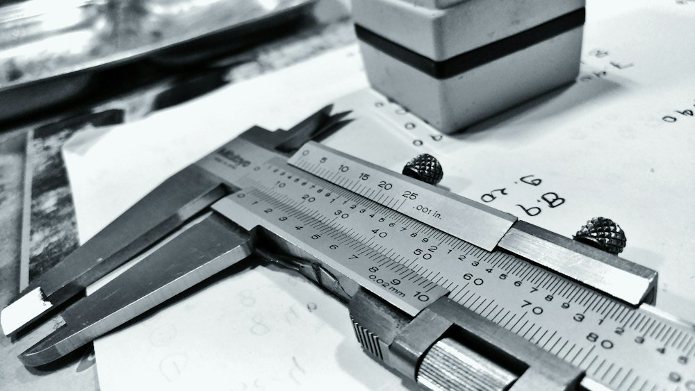 Vernier caliper on an engineering drawing (demonstration image)