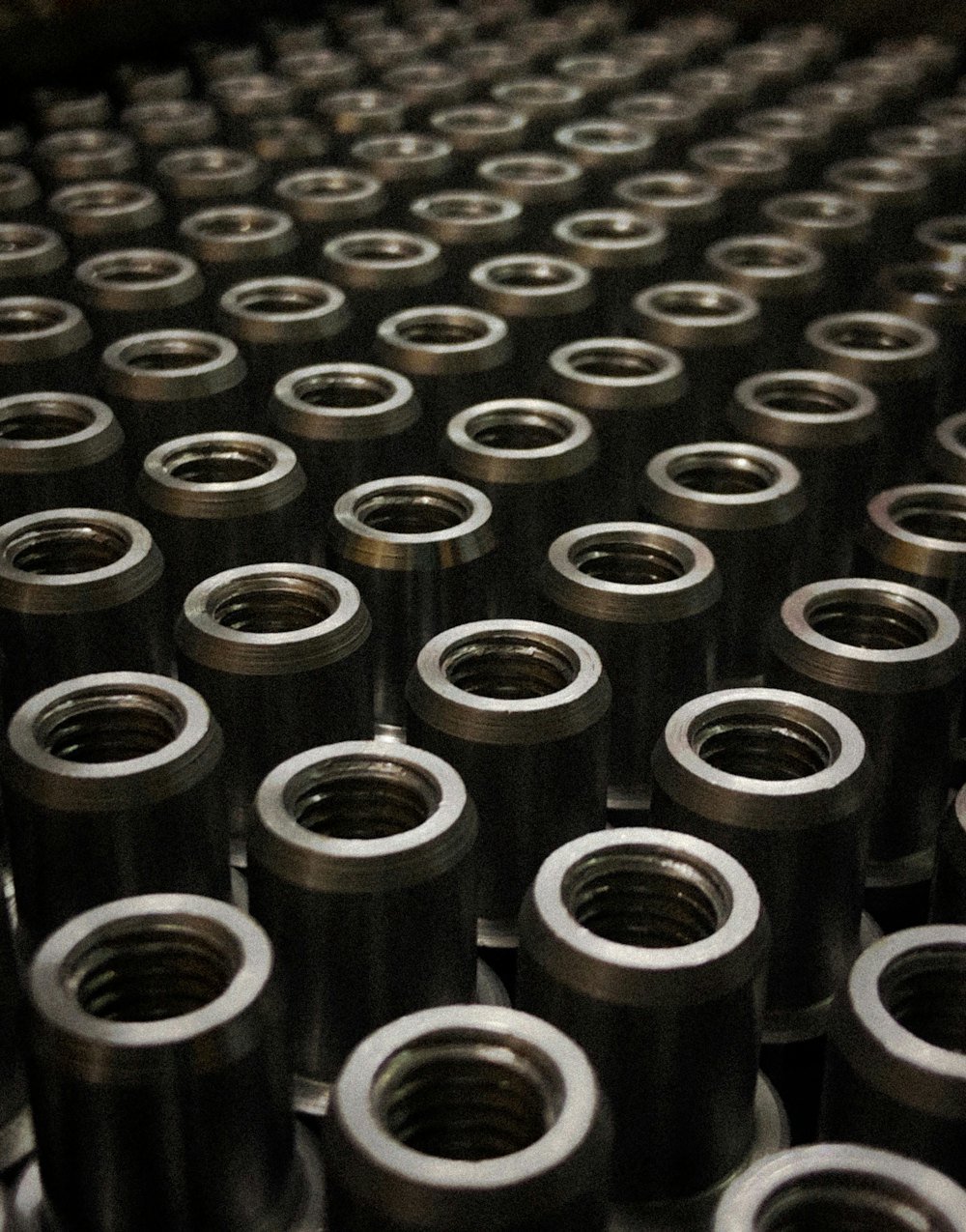 Batch of threaded machined components (demonstration image)